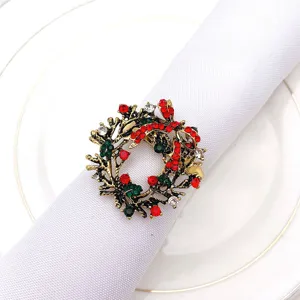 Christmas wreath napkin ring with red green rhinestones, elegant alloy table decor for holiday.
