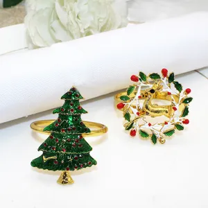Christmas napkin rings set featuring enameled rhinestone tree and reindeer wreath for holiday dining.