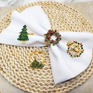 Christmas napkin rings set, alloy holiday table decor with tree and deer designs.