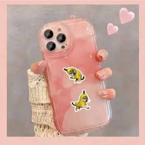 Pink gradient phone case with cute banana cat design, clear protector for iPhone.