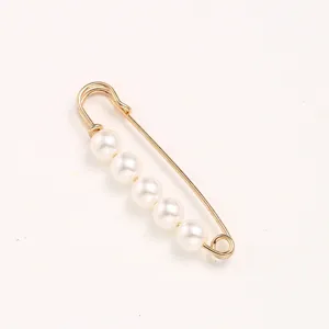 Pearl safety pin waist tightener anti-glare brooch for women clothing dress pants.
