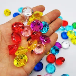 Close-up view of vibrant colorful acrylic crystal diamond toys, showing multiple sparkling facets.