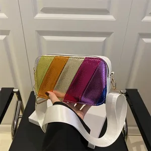 Detail view of the colorful metallic striped camera bag showcasing textured multi-color leather.