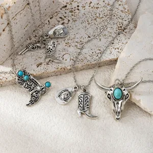 Close-up details of vintage Western cowboy style alloy necklaces with turquoise charms.