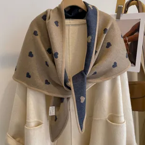 Detailed view of the thickened heart jacquard double-sided triangular shawl fabric.
