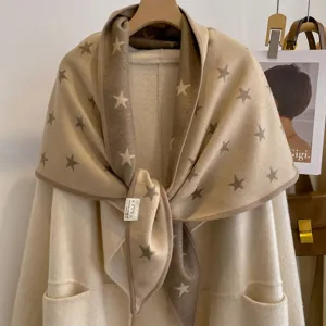 Close-up detail of the thick star jacquard double-sided triangular shawl with exquisite piping.