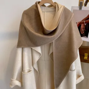 Detailed view of the double-sided color block triangular shawl, thick warm autumn cape for women.