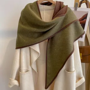 Detailed view of a stylish double-sided contrast color triangle shawl draped elegantly.