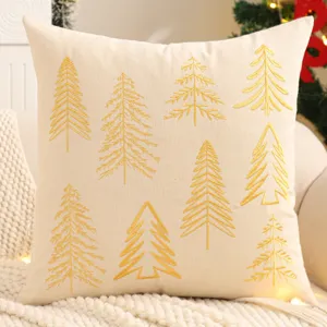 Christmas tree embroidered canvas cushion cover detail showing golden festive holiday decor.