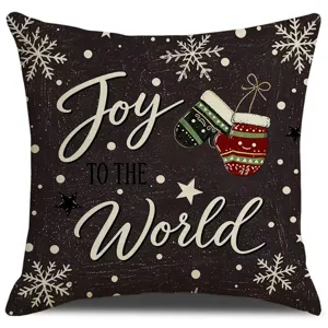 Christmas decorative cushion cover with Joy To The World print and snowflake patterns.