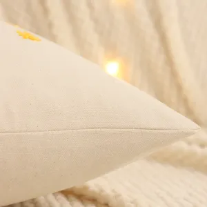 Detailed close-up view of the Christmas decorative canvas pillow cover with delicate embroidery texture.