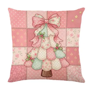 Federa per cuscino natalizio rosa con albero e fiocco per decorare il divano durante le feste.