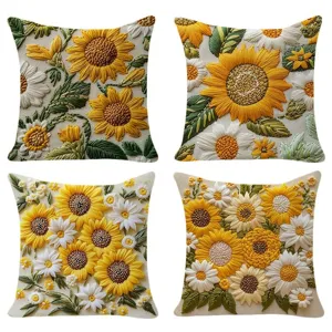 Detailed close-up view of embroidered sunflower pillow covers featuring vibrant floral patterns.