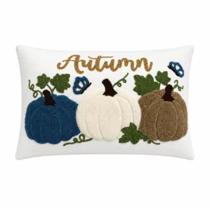 Detailed view of autumn tufted pumpkin decorative pillow cover for Thanksgiving holiday sofa.