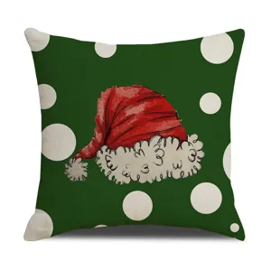 Christmas decorative pillow cover with green polka dots and watercolor Santa hat design for home.