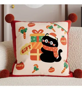 Festive red Christmas cat throw pillow with corner pom poms for sofa room decor.