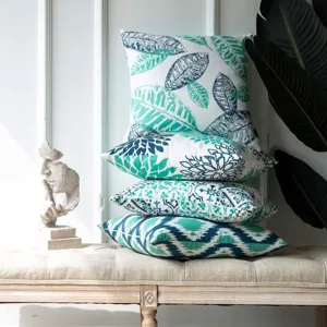 Modern printed throw pillow covers set, abstract leaf and geometric patterns for sofa decor.