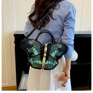 Unique butterfly shape shoulder bag with green and black wings, stylish crossbody handbag.