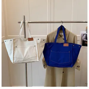 Casual canvas tote bag for women, large capacity shoulder handbag, retro style daily use.