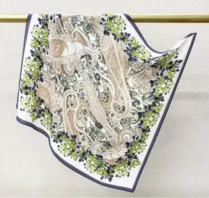 Elegant 65cm silk square scarf featuring classic paisley and floral print design, ideal for women.