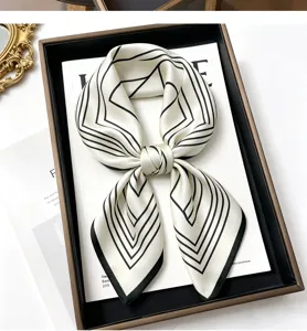 100% mulberry silk square scarf with chic black and white geometric stripe design.