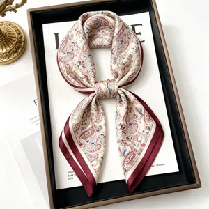Luxury 100% silk square scarf featuring elegant paisley print and chic maroon border.
