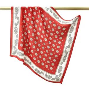 Red silk square scarf with classic paisley print, elegant 65cm neckerchief for women.