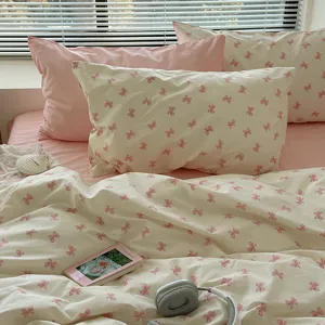 Parure de lit nœud rose douce housse de couette et taies d'oreiller chambre mignonne.