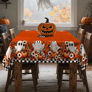 Détail de nappe d'Halloween avec motif de fantôme mignon et citrouille, déco automne.