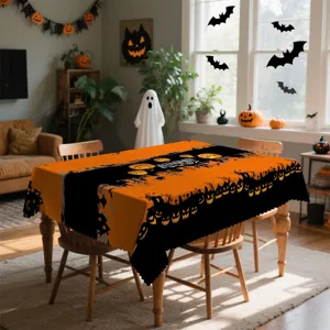 Scene de nappe d'Halloween en polyester avec citrouilles et chauves-souris pour decoration.