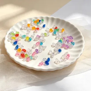 Colorful simulated crystal ice crushed stones for jewelry making and photography decor.