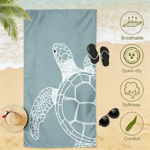 Detailed beach towel view showcasing soft texture, quick-dry fabric and sea turtle print.