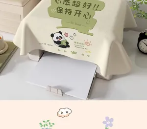 Detailed close-up of cute panda printer dust cover cloth with positive quotes, cozy home decor.