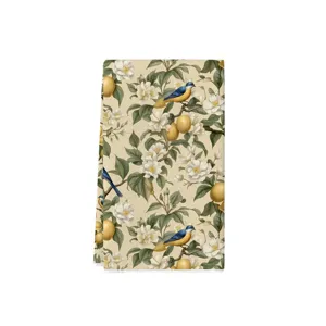 Vista dettagliata del panno da cucina in microfibra con stampa botanica di limoni e uccelli.