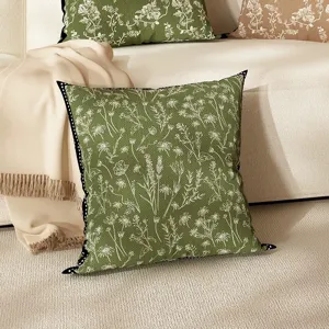 Green floral throw pillow detail shot, botanical line art cushion cover for living room sofa