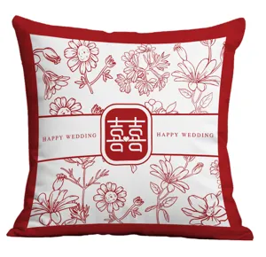 Chinese wedding red decorative pillowcase with double happiness symbol and floral line art.