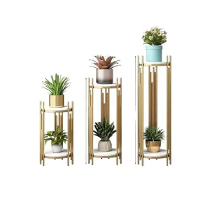 Modern gold metal plant stand set of 3 with white marble pattern shelves for indoor living room decor