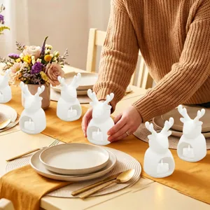 Portacandela a forma di renna in ceramica bianca per decorazione tavola di Natale.