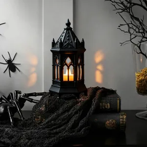 Gothic style LED candle lantern detail showing black castle design and spooky Halloween party decor.