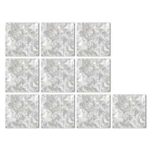 Primer plano detallado de pegatinas de azulejos de cristal adhesivas con patron de nácar.