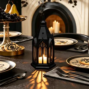 Gothic style LED candle lantern detail showing intricate black steeple design and warm ambient lighting.