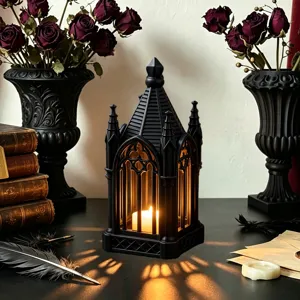 Gothic style LED candle lantern night light detail, vintage black architecture desktop decor.