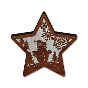 Detailed close-up view of the wooden star Christmas decoration featuring intricate hollow snowman design.