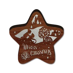 Wooden Christmas star decoration ornament with festive engraved text for holiday desktop display.