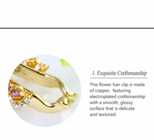 Close-up detail of the metal floral hair clip showing smooth electroplated finish and rhinestones.