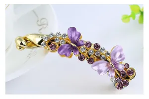 Exquisite alloy rhinestone butterfly banana hair clip detail view, elegant purple hair accessory.