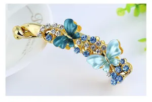 Elegant rhinestone butterfly banana clip for women, alloy hair accessory and elegant hair styling tool.