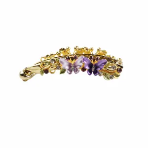 Gold tone alloy banana hairpin detail, purple enamel butterfly and sparkling rhinestone decor.