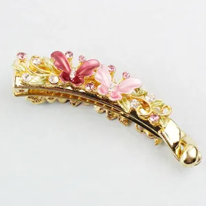 Elegant gold alloy banana hair clip featuring colorful enamel butterflies and sparkling rhinestones.