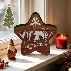 Wooden lighted Christmas star Nativity scene ornament for festive holiday desktop home decor detail.